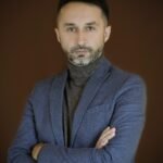 man, model, portrait, guy, male model, profile, modeling, pose, posing, style, jacket, blazer, turtle neck, outfit, fashion, men's fashion, studio photography, blazer, blazer, blazer, blazer, blazer, turtle neck, turtle neck