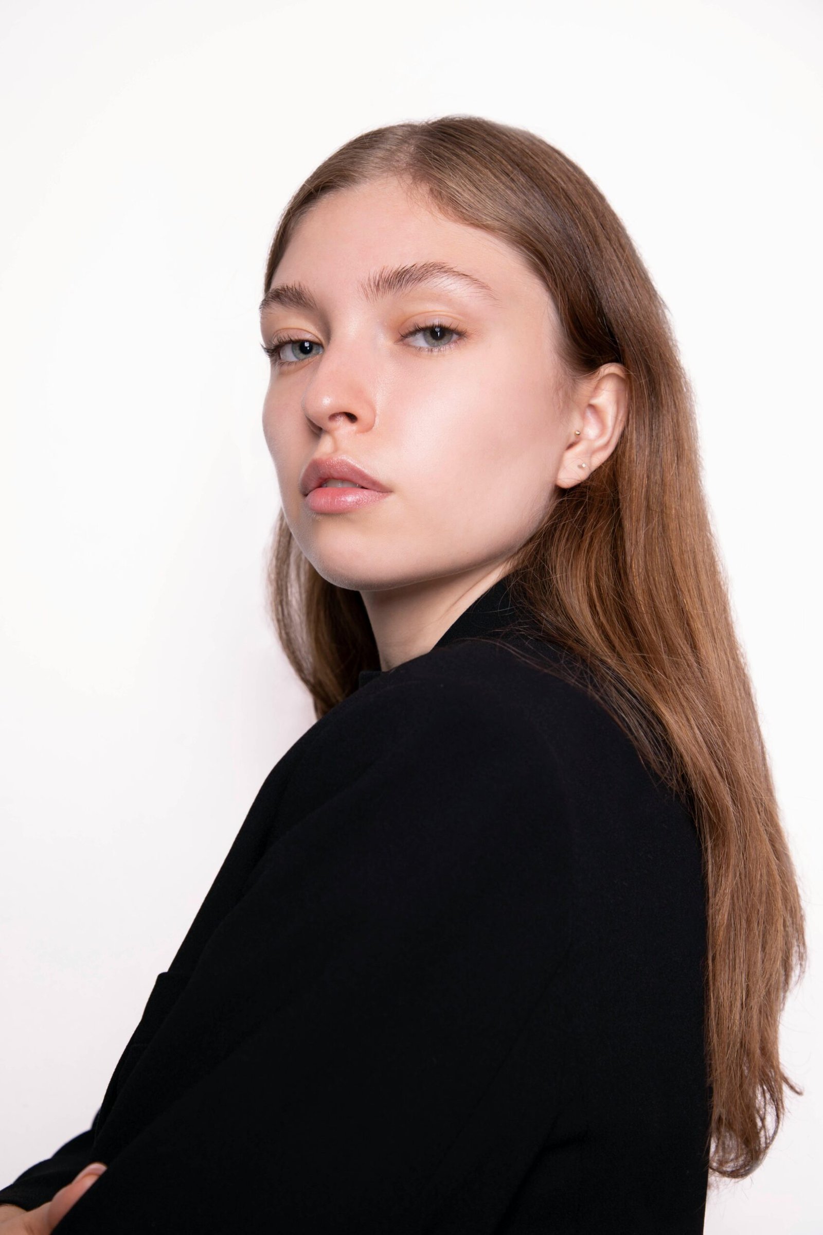 Captivating female portrait showing natural elegance and introspection.